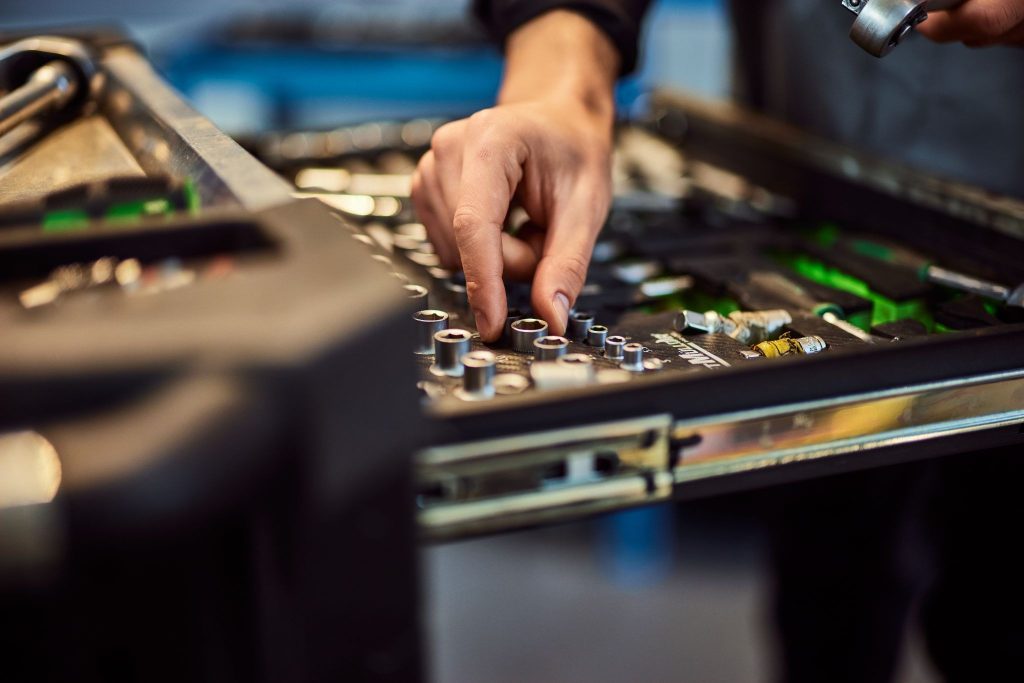 What is electro industrial music and how does it differ from industrial music?