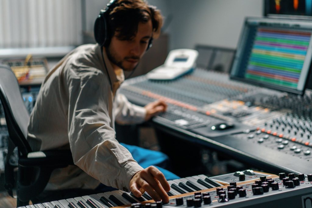 What skills are essential to become a successful electronic music producer?